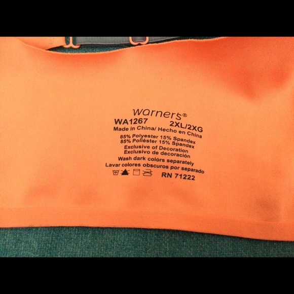 This bra was never worn. It is bright orange with adjustable straps. - Picture 2 of 3